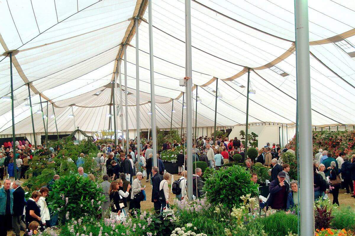 80' Traditional Marquee at a Flower Show showing people looking at the exhibits 